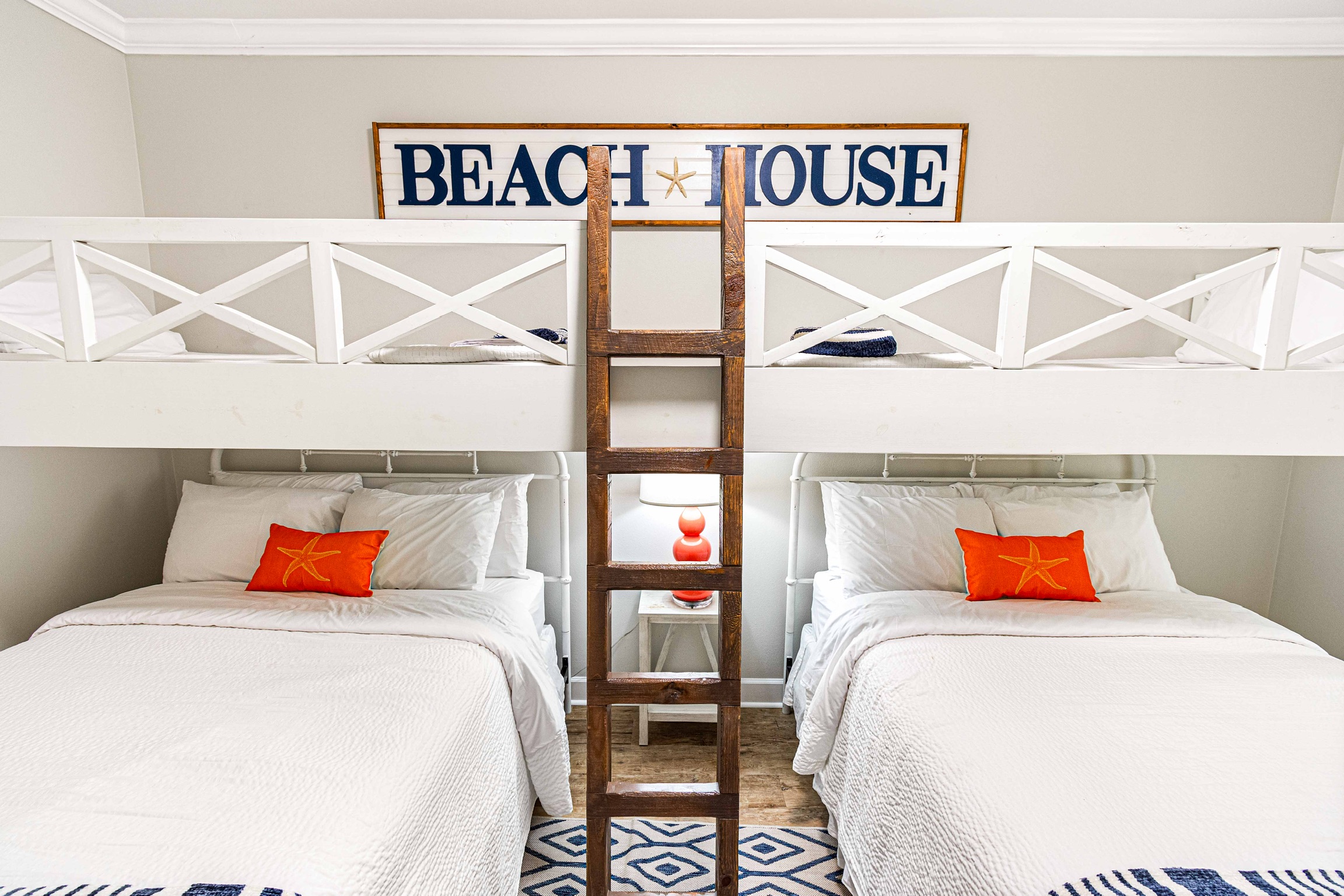 Bluebird family bedroom with queen beds and lofted twins