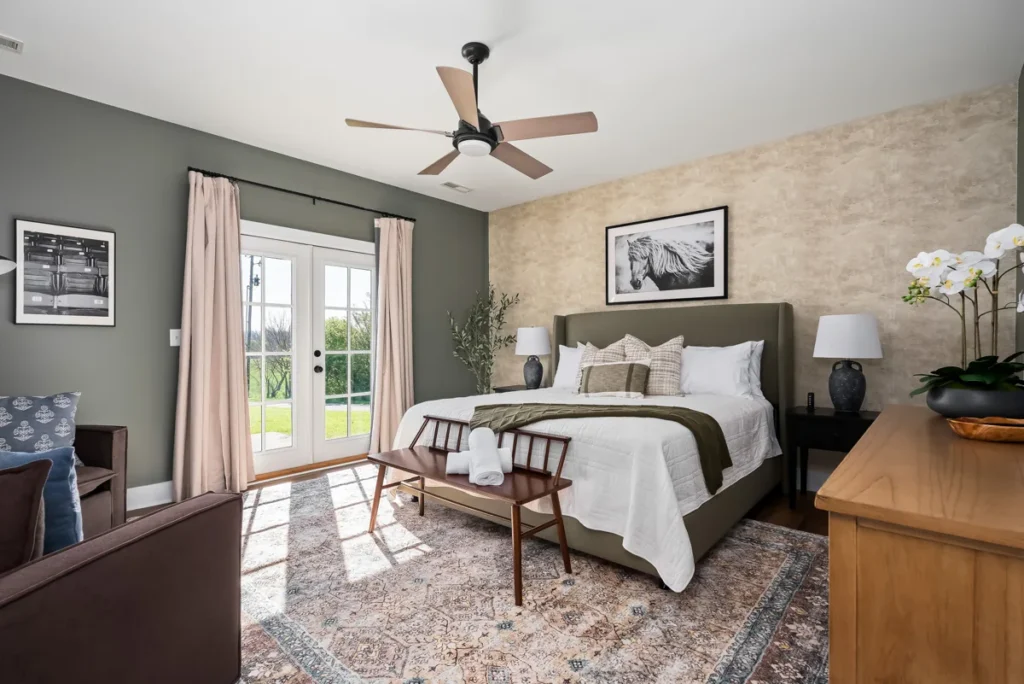 Main-level primary bedroom with a king bed at the Farmhouse