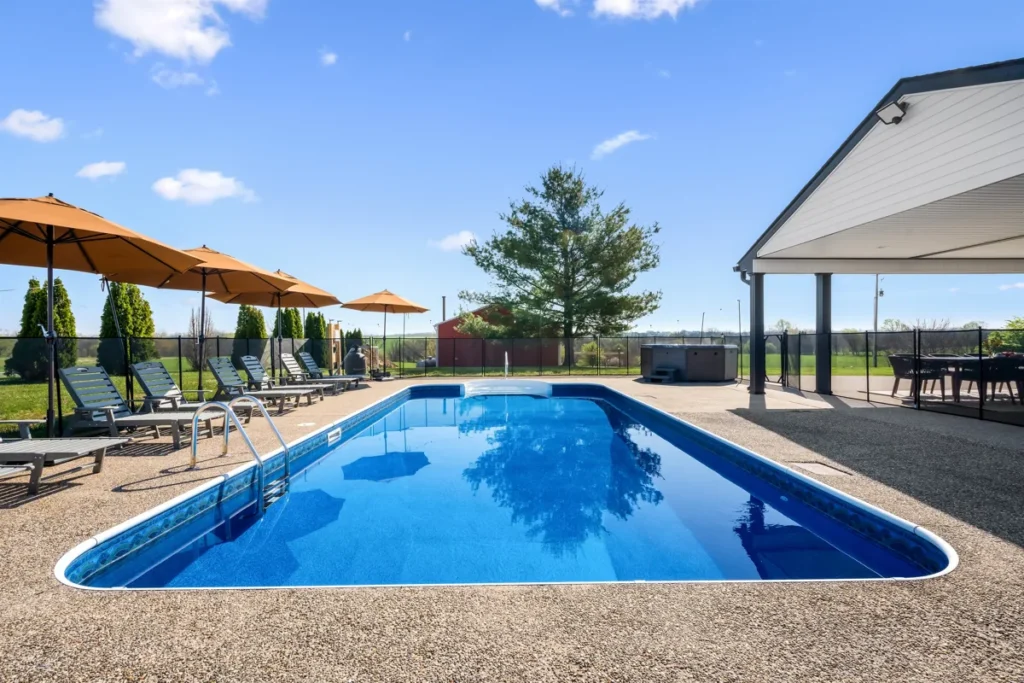 Private seasonal pool beside the Farmhouse covered patio