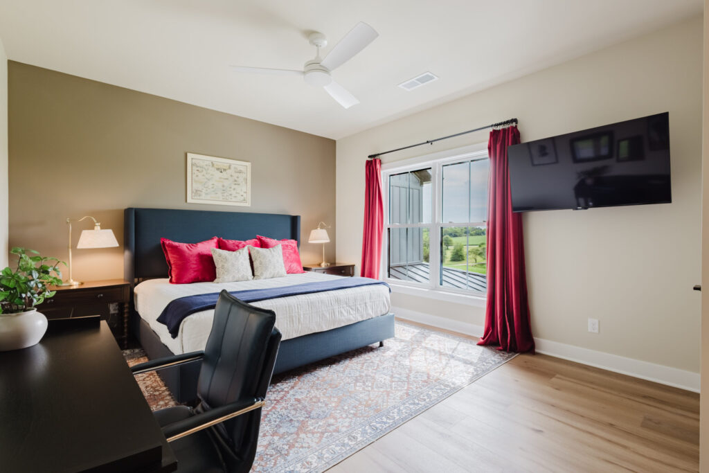 Abraham Lincoln bedroom with a king bed and red accents