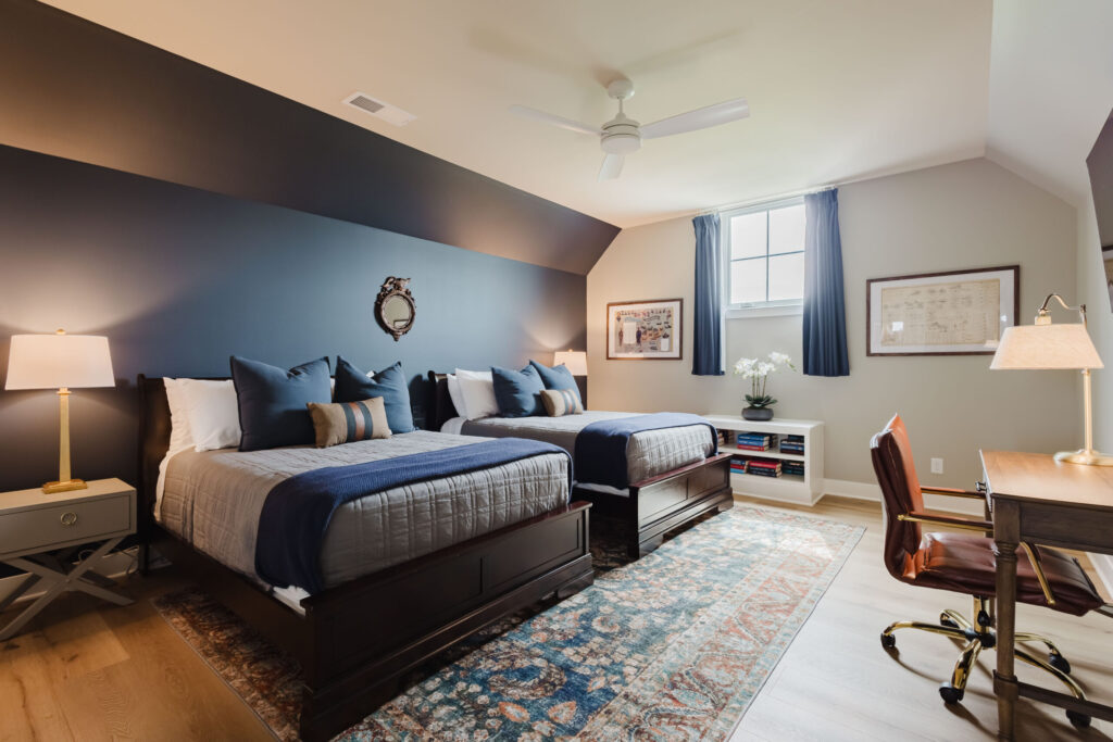 Civil War bedroom with two full beds and historic Kentucky decor