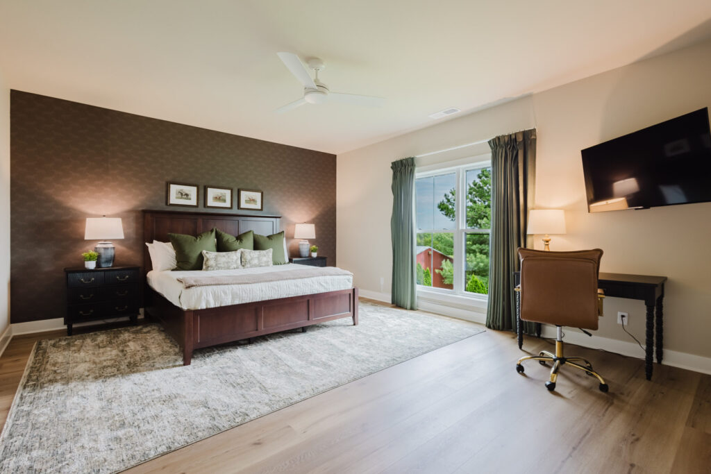 Thoroughbred Racing bedroom with a king bed and Kentucky racing decor